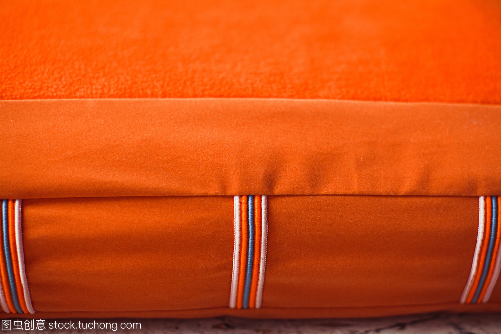 橙色宠物床垫的特写纺织品